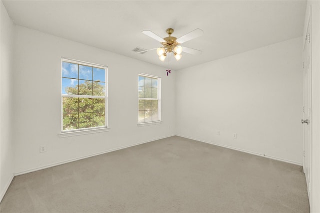 2904 Bristol Bend Ln, Dickinson, TX 77539 - spare room featuring healthy amount of natural light, carpet, and ceiling fan