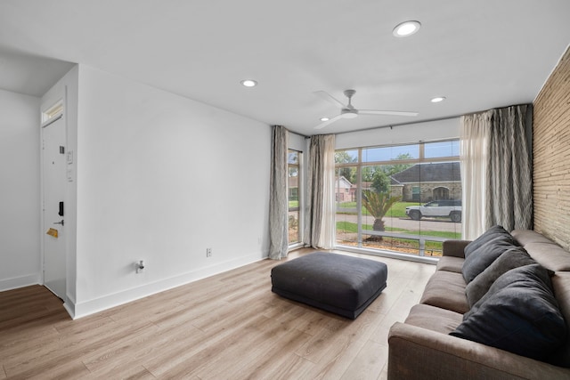 7822 Oldhaven St, Houston, TX 77074 - living area featuring recessed lighting, a ceiling fan, light wood-type flooring, and baseboards