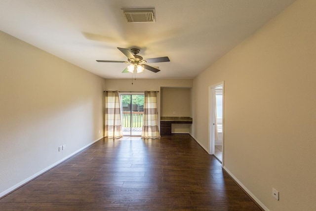 737 Davis Rd, League City, TX 77573 - spare room featuring dark wood-style floors, baseboards, a ceiling fan, and visible vents