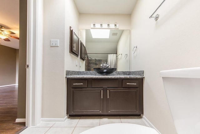 737 Davis Rd, League City, TX 77573 - full bath featuring ceiling fan, vanity, baseboards, and walk in shower
