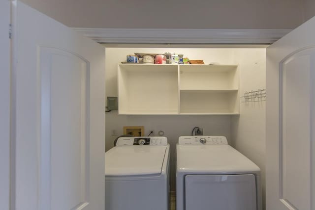 737 Davis Rd, League City, TX 77573 - laundry area with washing machine and dryer and laundry area