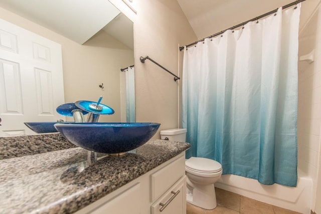 737 Davis Rd, League City, TX 77573 - bathroom featuring tile patterned floors, vanity, toilet, and shower / bath combination with curtain