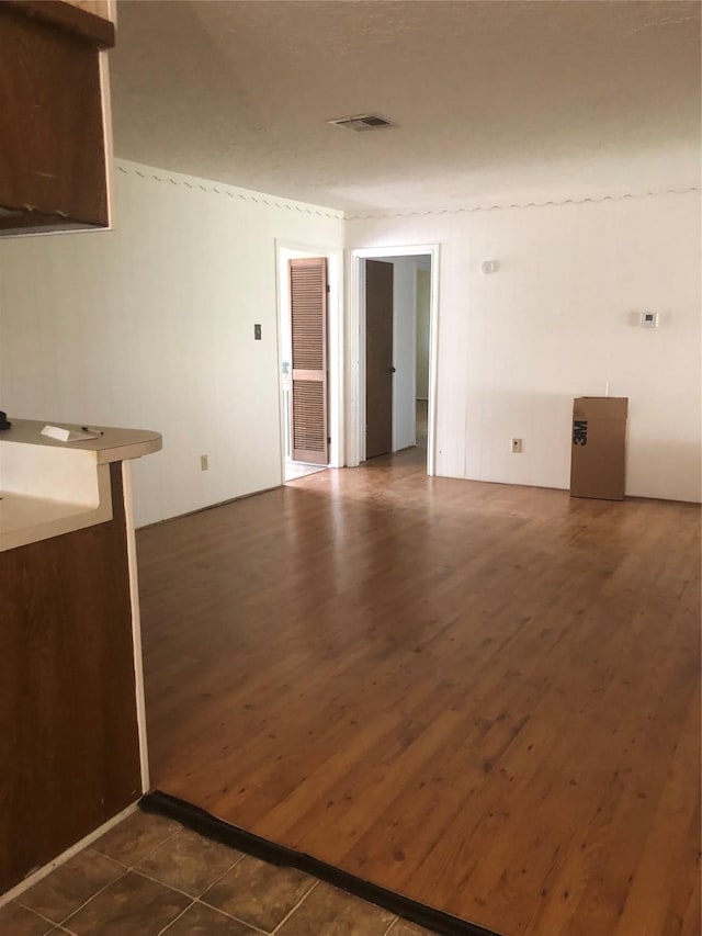 14407 Duncannon Dr, Houston, TX 77015 - spare room with visible vents and dark wood-style floors