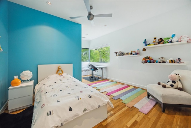 bedroom with recessed lighting, ceiling fan, baseboards, and wood finished floors