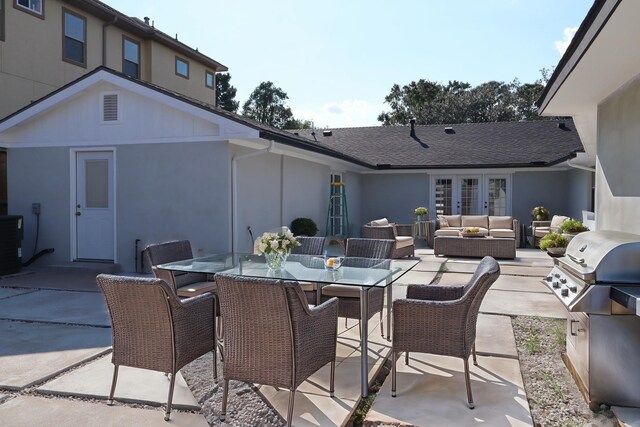9121 Fordshire Dr, Houston, TX 77025 - view of patio with french doors, an outdoor living space, and outdoor dining area