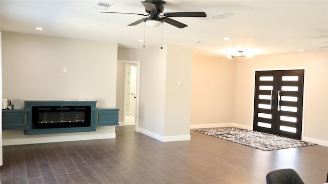 9121 Fordshire Dr, Houston, TX 77025 - foyer entrance with baseboards, recessed lighting, a ceiling fan, visible vents, and dark wood finished floors