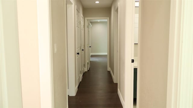 9121 Fordshire Dr, Houston, TX 77025 - hall with recessed lighting, dark wood-style floors, and baseboards