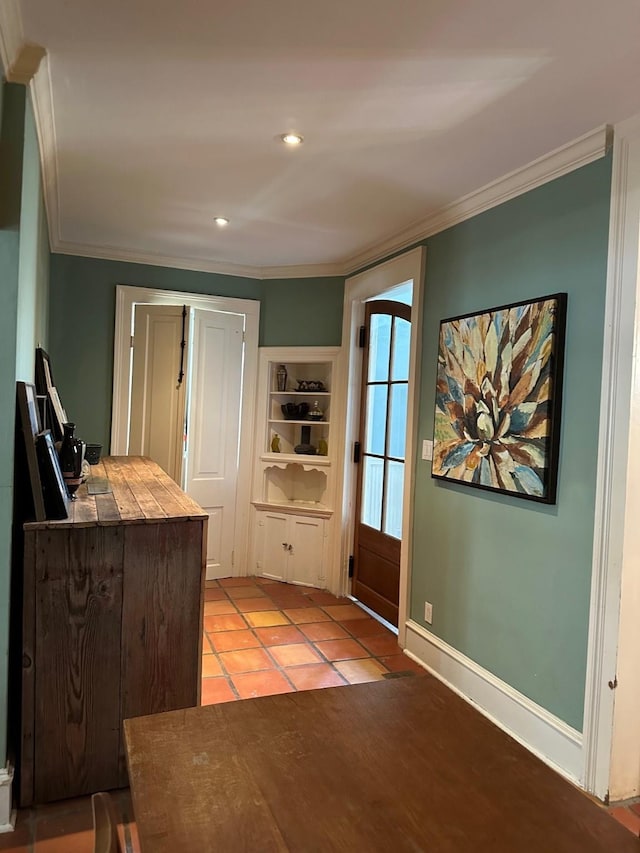 entryway with recessed lighting, light tile patterned floors, baseboards, and ornamental molding