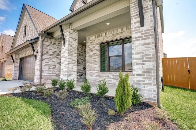 2904 Apple Rose, Katy, TX 77493 - view of side of home featuring fence, a garage, brick siding, and driveway