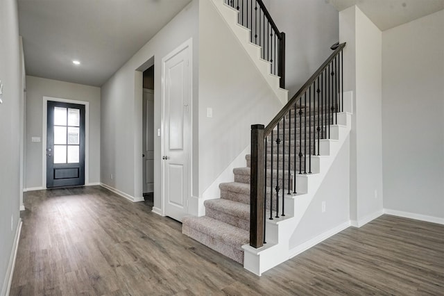 2904 Apple Rose, Katy, TX 77493 - entrance foyer featuring recessed lighting, wood finished floors, baseboards, and stairs