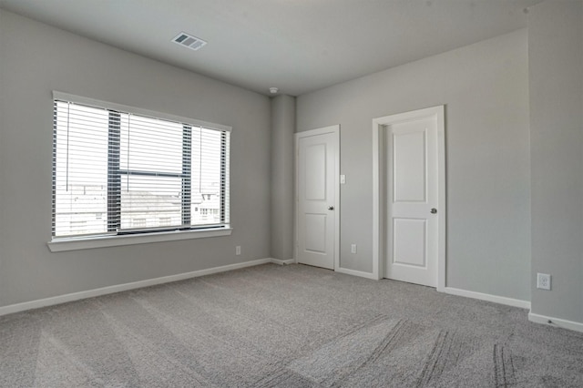 2904 Apple Rose, Katy, TX 77493 - carpeted empty room with visible vents and baseboards