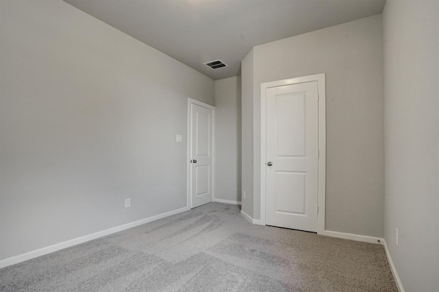 2904 Apple Rose, Katy, TX 77493 - unfurnished bedroom with carpet, baseboards, and visible vents