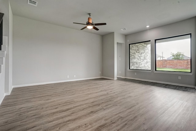 2904 Apple Rose, Katy, TX 77493 - empty room featuring baseboards, a ceiling fan, visible vents, and wood finished floors