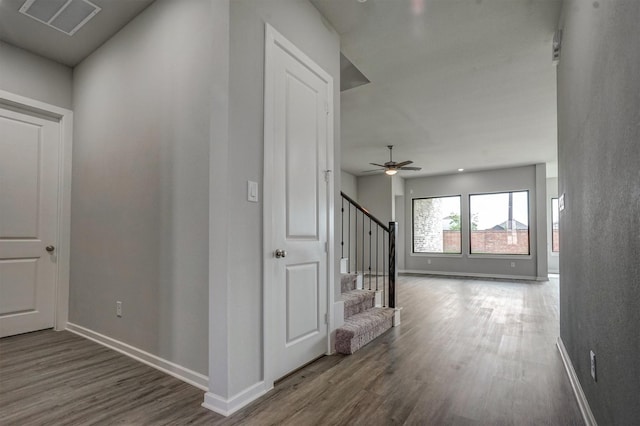 2904 Apple Rose, Katy, TX 77493 - hall featuring stairway, wood finished floors, baseboards, and visible vents