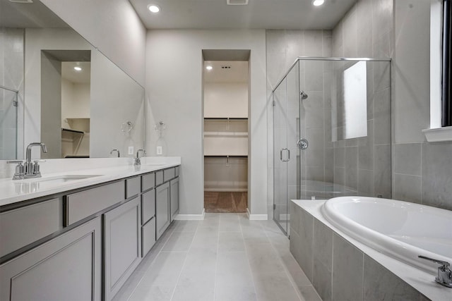 2904 Apple Rose, Katy, TX 77493 - full bathroom with a sink, a spacious closet, and a shower stall
