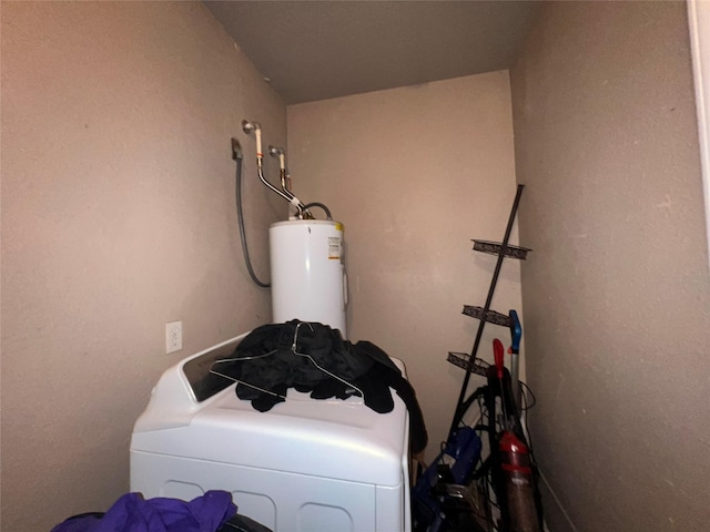 interior space with water heater and laundry area