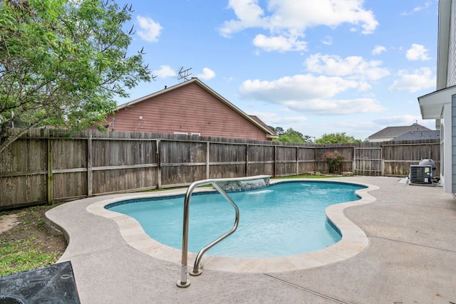 1069 Shadow Glenn Dr, Conroe, TX 77301 - view of pool featuring a fenced backyard, a patio, a fenced in pool, and central AC