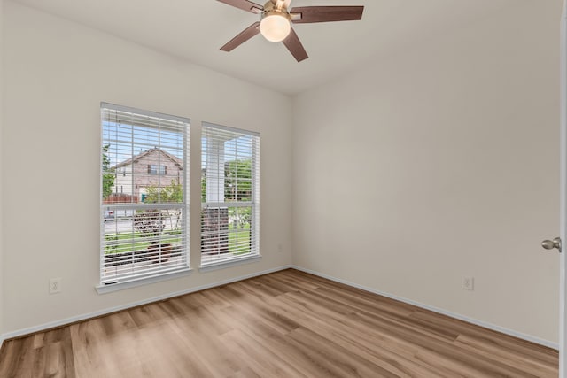 1069 Shadow Glenn Dr, Conroe, TX 77301 - empty room featuring baseboards and light wood-type flooring