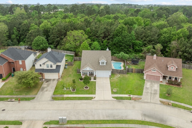 1069 Shadow Glenn Dr, Conroe, TX 77301 - drone / aerial view with a forest view