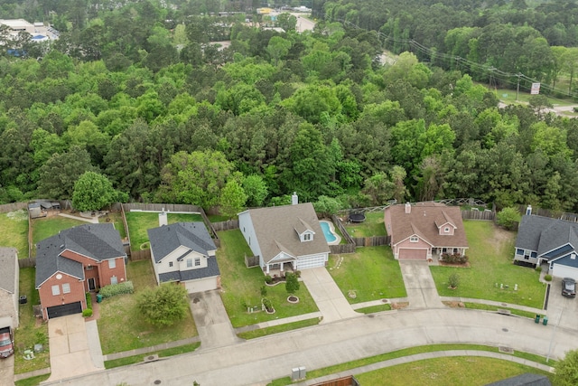 1069 Shadow Glenn Dr, Conroe, TX 77301 - birds eye view of property featuring a forest view and a residential view