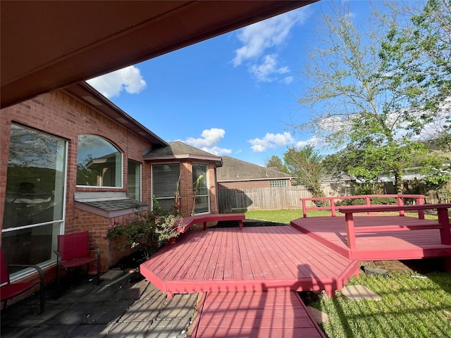 4311 Lakeside Meadow Dr, Missouri City, TX 77459 - wooden terrace with a fenced backyard and a yard