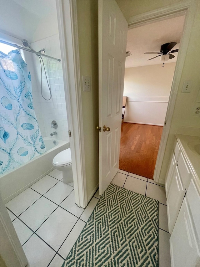 4311 Lakeside Meadow Dr, Missouri City, TX 77459 - bathroom with toilet, vanity, shower / bathtub combination with curtain, tile patterned flooring, and ceiling fan