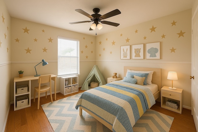 4311 Lakeside Meadow Dr, Missouri City, TX 77459 - bedroom with wallpapered walls, wood finished floors, and a ceiling fan