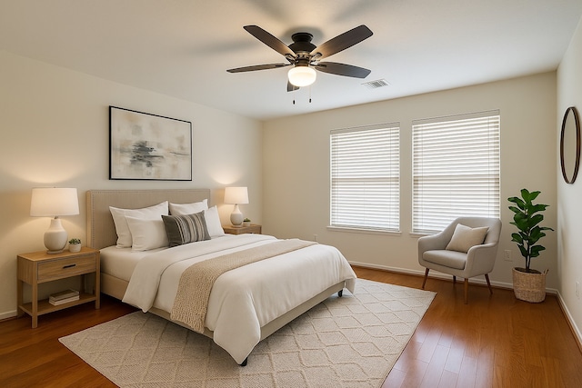 4311 Lakeside Meadow Dr, Missouri City, TX 77459 - bedroom featuring baseboards, visible vents, a ceiling fan, and wood finished floors