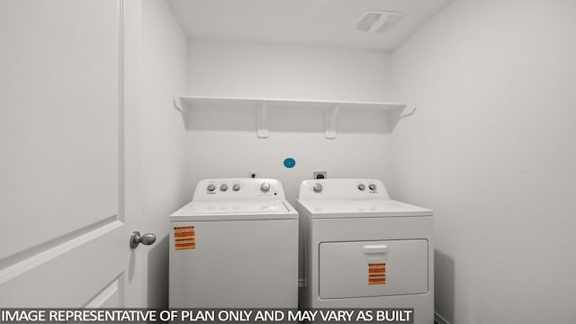 1342 Heather Rosewood Ln, Conroe, TX 77301 - laundry area featuring washing machine and dryer