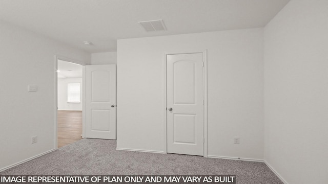 1342 Heather Rosewood Ln, Conroe, TX 77301 - unfurnished bedroom with carpet floors and baseboards