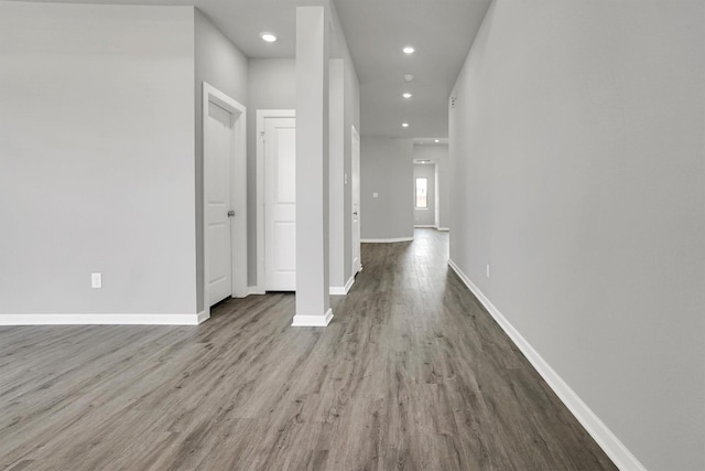 2916 Apple Rose, Katy, TX 77493 - corridor with baseboards, wood finished floors, and recessed lighting