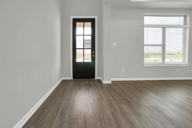 2916 Apple Rose, Katy, TX 77493 - doorway with dark wood finished floors, baseboards, and a healthy amount of sunlight