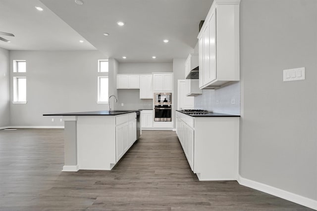 2916 Apple Rose, Katy, TX 77493 - kitchen with dark countertops, decorative backsplash, baseboards, and stainless steel appliances