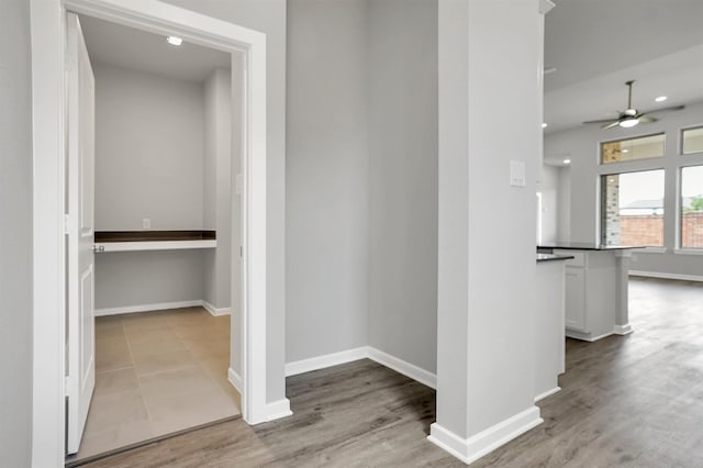 2916 Apple Rose, Katy, TX 77493 - hallway featuring baseboards, wood finished floors, and recessed lighting