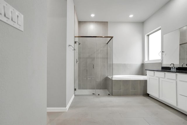 2916 Apple Rose, Katy, TX 77493 - full bathroom featuring a stall shower, recessed lighting, tile patterned flooring, a garden tub, and vanity