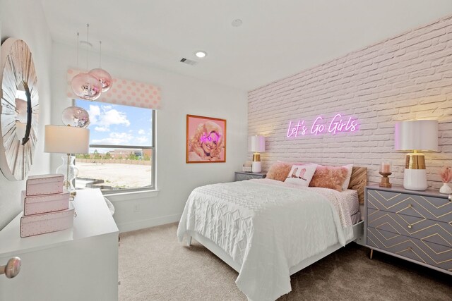 15850 Invergelder Dr, Atascocita, TX 77346 - carpeted bedroom featuring visible vents, baseboards, and brick wall