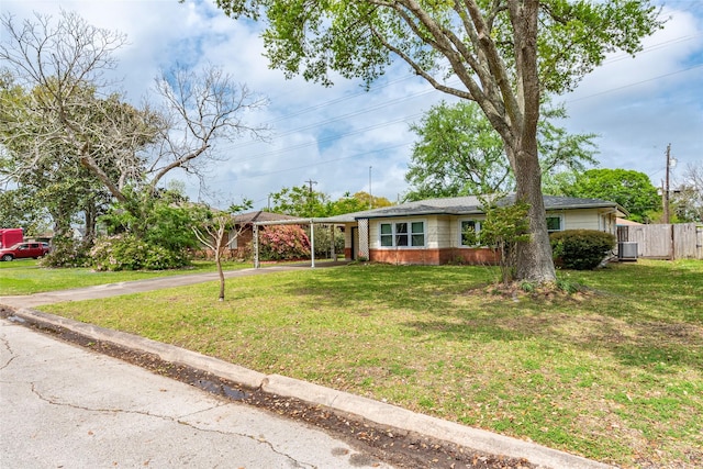 2902 Patricia St, La Marque, TX 77568 - ranch-style house with asphalt driveway, central air condition unit, and brick siding