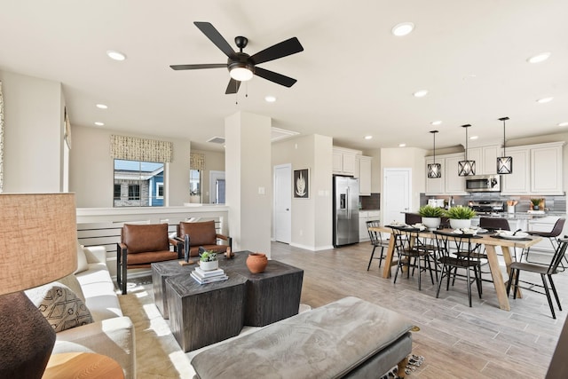 15854 Invergelder Dr, Atascocita, TX 77346 - living area with recessed lighting, a ceiling fan, and light wood finished floors