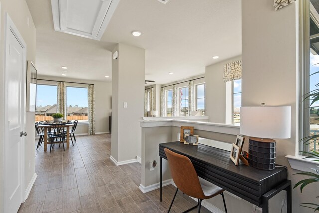 15854 Invergelder Dr, Atascocita, TX 77346 - home office with baseboards, wood finished floors, and recessed lighting