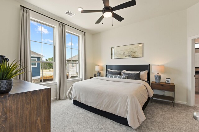 15854 Invergelder Dr, Atascocita, TX 77346 - carpeted bedroom featuring baseboards and a ceiling fan