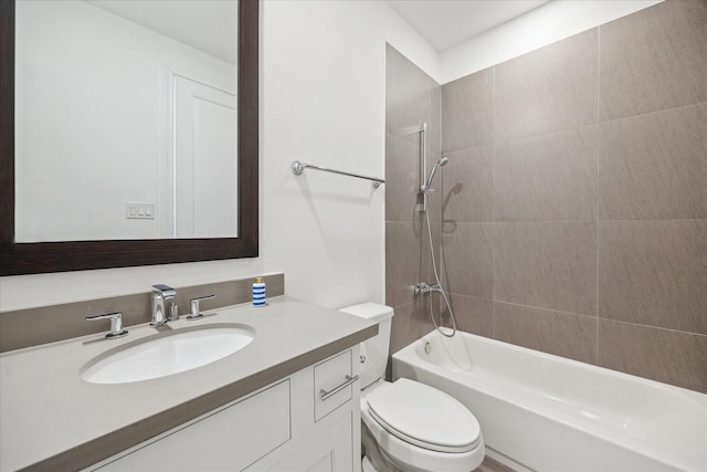 full bath featuring vanity, toilet, and  shower combination