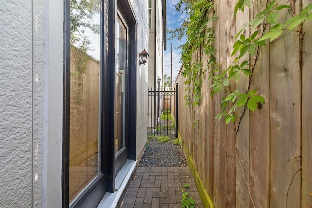 view of property exterior featuring fence