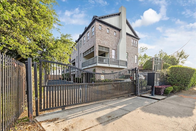 view of gate featuring fence private yard