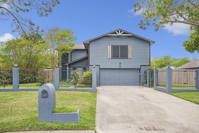 traditional-style house featuring a garage, a front lawn, fence, and concrete driveway