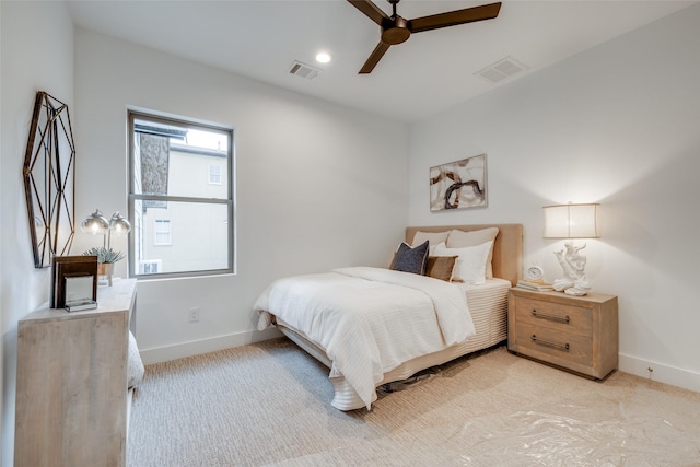 626 E 14th St, Houston, TX 77008 - bedroom featuring baseboards, light carpet, and ceiling fan