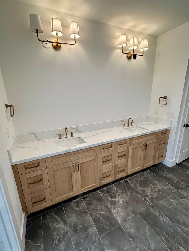 626 E 14th St, Houston, TX 77008 - bathroom with double vanity, a chandelier, marble look tile flooring, and baseboards