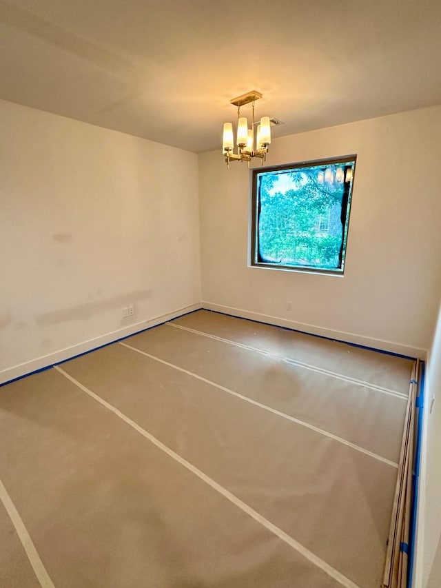 626 E 14th St, Houston, TX 77008 - spare room featuring a chandelier and baseboards