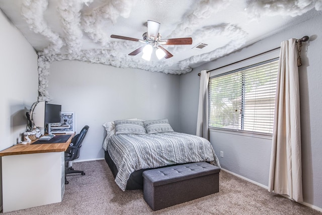 231 Spencer Lndg E, La Porte, TX 77571 - carpeted bedroom featuring an office area, baseboards, and a ceiling fan