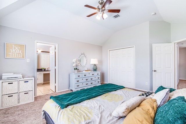 231 Spencer Lndg E, La Porte, TX 77571 - bedroom featuring light carpet, lofted ceiling, a closet, connected bathroom, and a ceiling fan