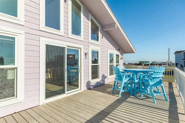 4406 Tampico Way, Galveston, TX 77554 - wooden deck with outdoor dining space